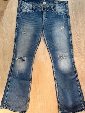Silver Jeans Faded Blue Distressed Bootcut Jeans